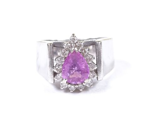 A 14ct white gold pink sapphire and diamond cluster ring, pear-shaped corundum approx 1.13ct, setting height 13mm, size J, 7.