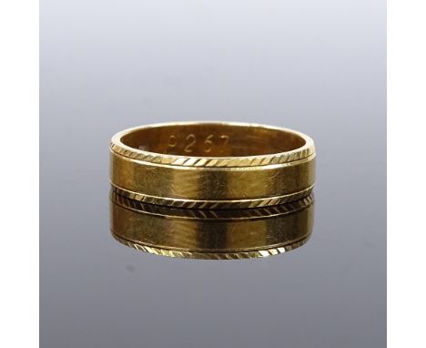 An 18ct gold wedding band ring, band width 4.7mm, size Q, 4.9g 