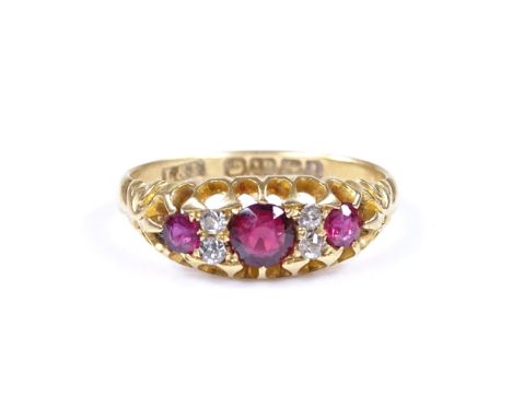 An 18ct gold 7-stone ruby and diamond half-hoop ring, setting height 6.6mm, size M, 2.7g 