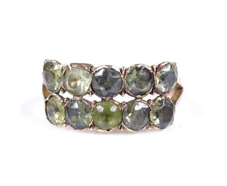 An Antique unmarked gold double-row peridot ring, set with 10 stones, setting height 8.7mm, size L, 2.9g 