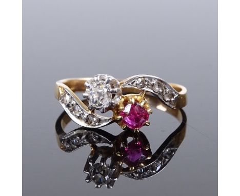 An unmarked gold ruby and diamond crossover ring, with rose-cut diamond shoulders, unmarked settings test as 18ct gold, setti