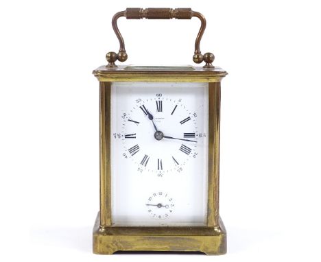 A 19th century French brass-cased carriage clock, with 8-day striking movement, case height 11cm, in leather travelling case 