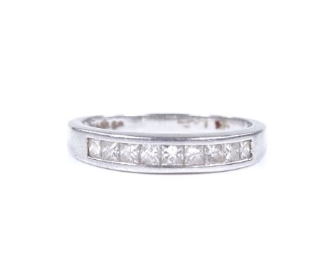A platinum and diamond half eternity band ring, Princess-cut diamond content approx 0.5ct, setting height 3.7mm, size N, 3.7g