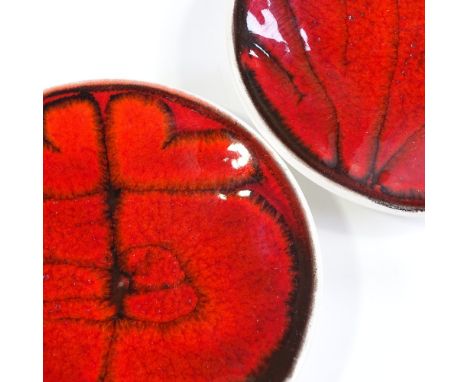 2 early Poole Pottery Studio pin dishes, hand painted decoration, with blue Studio back stamps, 1962 - 64, diameter 12.5cm 