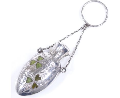 A Victorian miniature silver perfume bottle flask, with inset hardstone shamrock decoration, hanging from a finger ring, by W