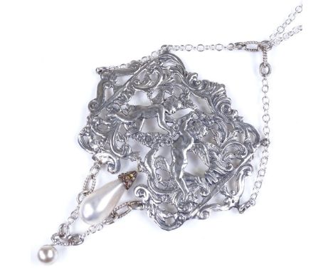 A large Victorian silver pearl and paste lavaliere pendant necklace, central pierced panel depicting cherubs and doves, on st
