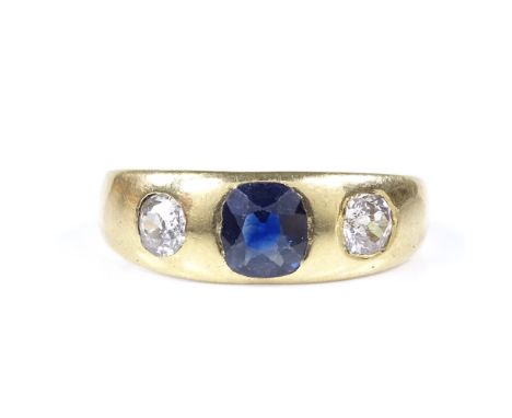 An unmarked gold 3-stone blue stone and diamond ring, setting height 6.6mm, size Q, 3.9g 