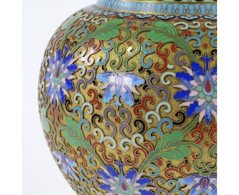 A good quality Oriental gilt-metal and cloisonne enamel vase on hardwood stand, height 35cm 
