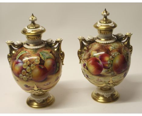 PAIR OF ROYAL WORCESTER FRUIT DESIGN TWO-HANDLED VASES BY S. WOOD AND P. ENGLISH H31CM