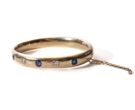 15CT GOLD DIAMOND AND SAPPHIRE BANGLE TOTAL WEIGHT 30G APPROX 100 PTS IN DIAMONDS