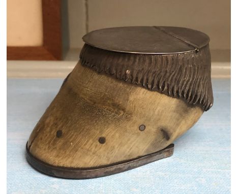 A Victorian silver topped miniature horse hoof snuff box, the lid engraved with armorial motifs and the motto 'IN DEO CONFIDO