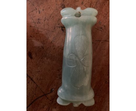 A carved jade toggle. (Dimensions: Length 10.5cm)(Length 10.5cm)