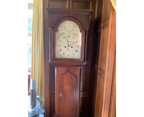 A George III oak cased 8 day longcase clock, J N Liddell, Morpeth, with a painted arched dial. (Dimensions: Height 202cm.)(He