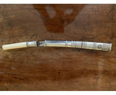 A late 19th/early 20h century Burmese dagger with ivory handle and silver mount and scabbard. (Dimensions: Length 49cm)(Lengt