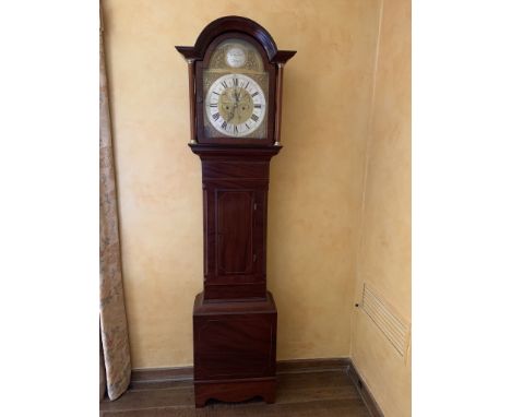 A George III inlaid mahogany eight day longcase clock, the arched brass dial with silvered chapter ring and seconds subsidiar