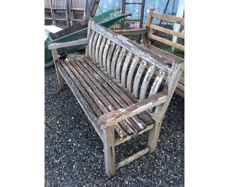 A Fire Island teak garden bench.