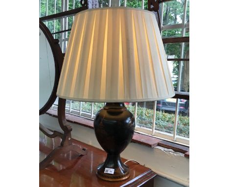 A black Japanned table lamp. (Dimensions: Height 36cm)(Height 36cm)