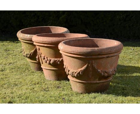 Garden Urn: A set of three Compton terracotta apple pots  early 20th century  with small circular manufacturer&#39;s stamp 41