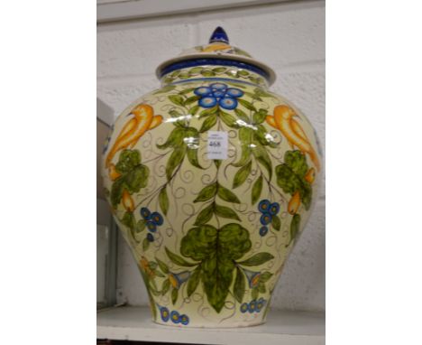 A good large Cantagalli vase and cover painted with birds amongst foliage.