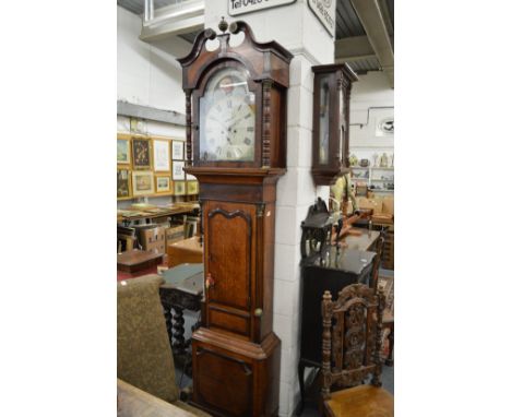 A good 19th century oak and mahogany longcase clock with painted arched dial, eight day movement with moon phase the dial sig