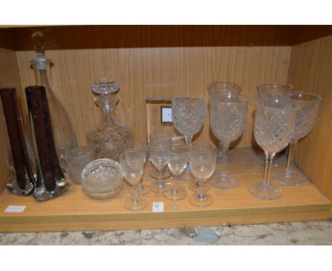 A shelf of glassware.