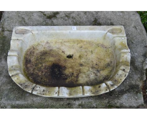 A carved marble basin.