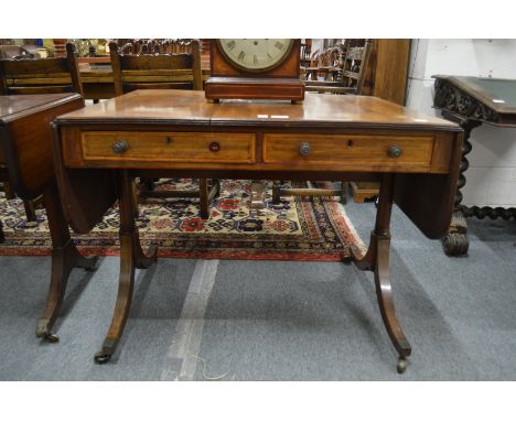 A Regency mahogany sofa table (split top).