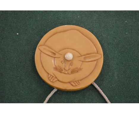 An unusual Japanese carved netsuke, signed.