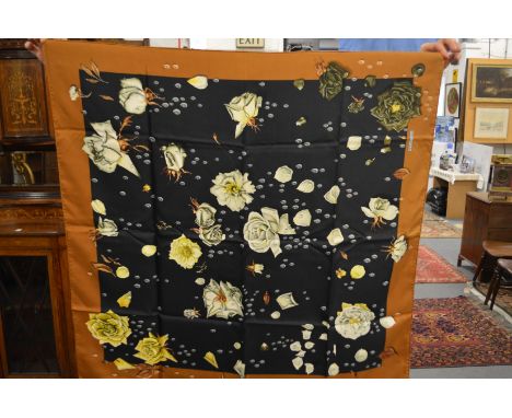 A Hermes silk scarf.