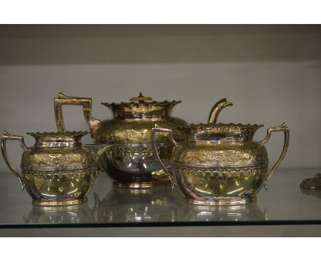 A plated three piece tea service.