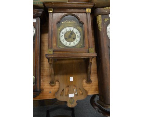 A walnut cased drop dial wall clock.