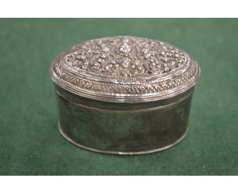 An eastern white metal snuff box.
