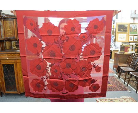 A Salvatore Ferragamo silk scarf.