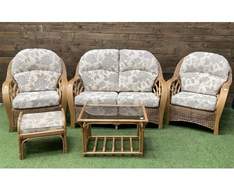 Two seat cane conservatory sofa, two armchairs, stool and coffee table