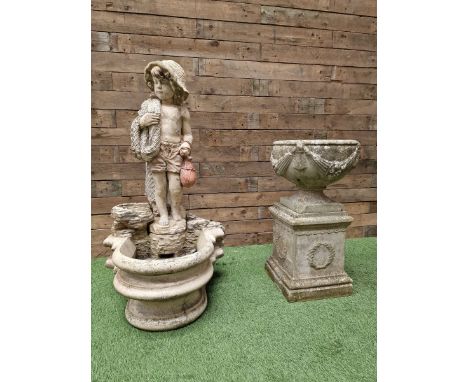 Three section cast stone garden figure of a boy carrying fishing net and a satchel with a water feature together with a cast 