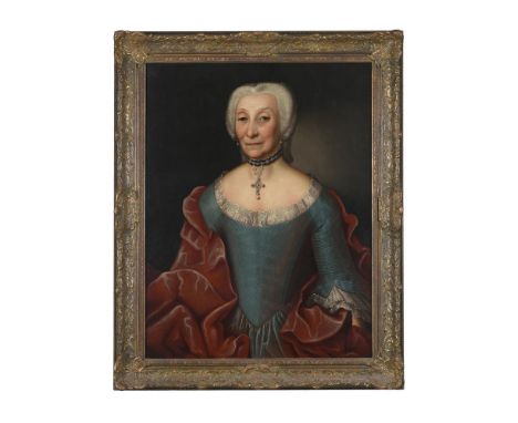 FRENCH SCHOOL (18TH CENTURY)PORTRAIT OF A LADY, HALF LENGTH, IN A BLUE DRESS WITH A RED WRAPOil on canvas82 x 63cm (32¼ x 24¾