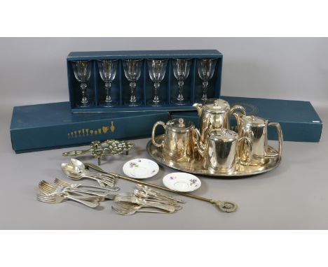 A lot of metalwares and glasswares including silver plated tea service on tray, cutlery, trivet and two boxed sets of six cry