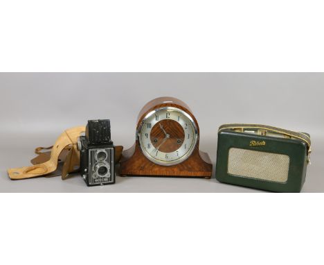 A walnut cased eight day mantel clock, a Roberts radio and a cased Ilford Craftsman box camera.