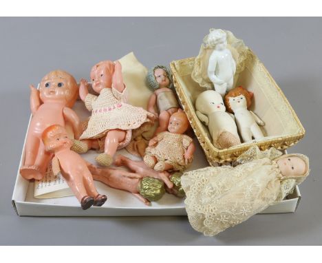 A collection of small vintage celluloid dolls.