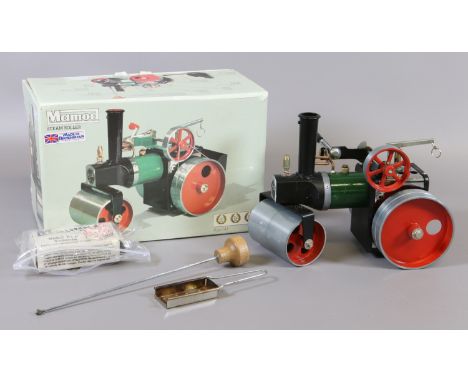 A boxed Mamod steam roller with accessories.