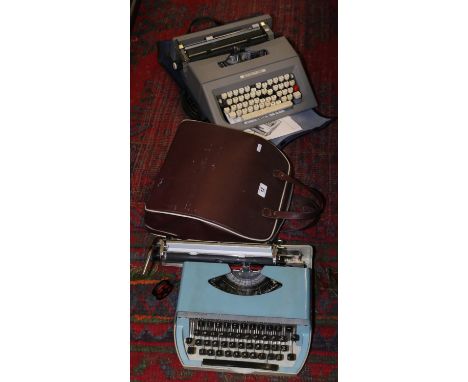 Two cased vintage typewriters to include a Boots PT1000 and an Italian Engadine.