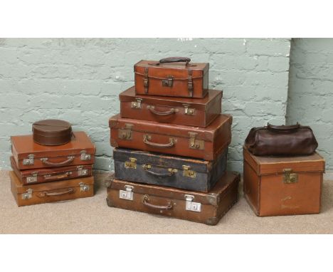 Eleven vintage leather cases including suitcases and bowls bag.