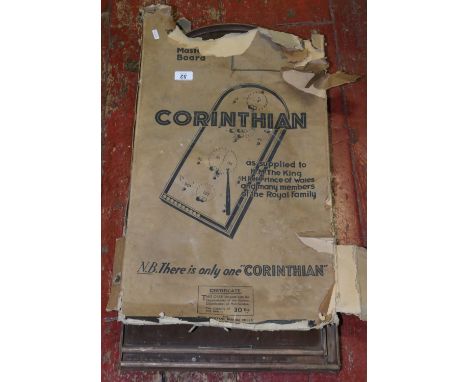 A Corinthian bagatelle board in original box.