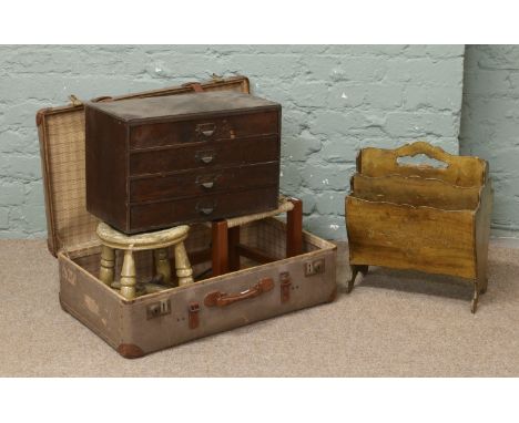 A vintage suitcase and contents, a filing chest, milking stool, magazine stand etc