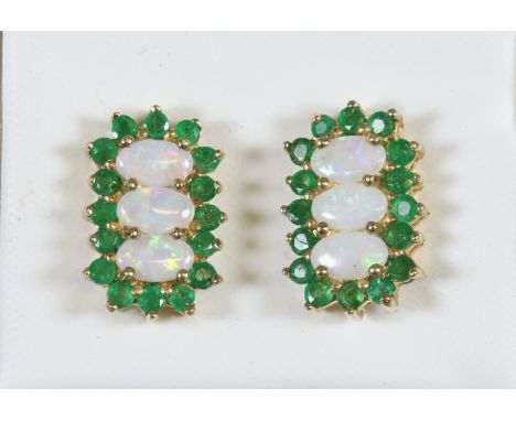 A pair of 9ct gold opal and emerald earrings with valuation certificate, 2.66 grams gross.