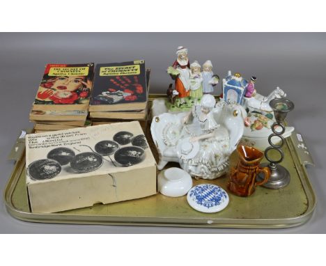 A tray lot including paper back Agatha Christie, ceramic figures, cricket and tennis ball etc.