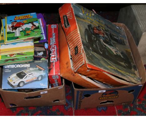 Collection of childrens board games, two boxed vintage, VIP Raceways remote controlled games and eight Laurel and Hardy annua
