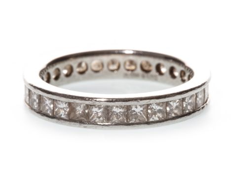 A DIAMOND ETERNITY RING, set with princess cut diamonds totalling very approximately 2.00 carats, unmarked, size M, 4.9g