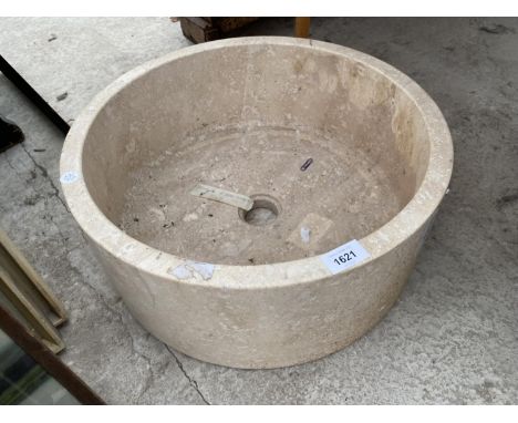 A CREAM SOLID MARBLE WASH BASIN 