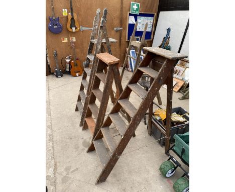 THREE VINTAGE WOODEN STEP LADDERS TO INCLUDE A FOUR RUNG, FIVE RUNG AND SIX RUNG 